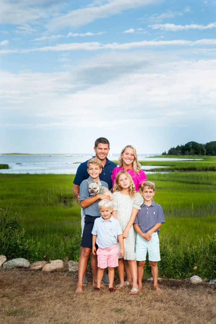 Dr. Kevin Oliveira with his wife and four children on the Massachusetts coast